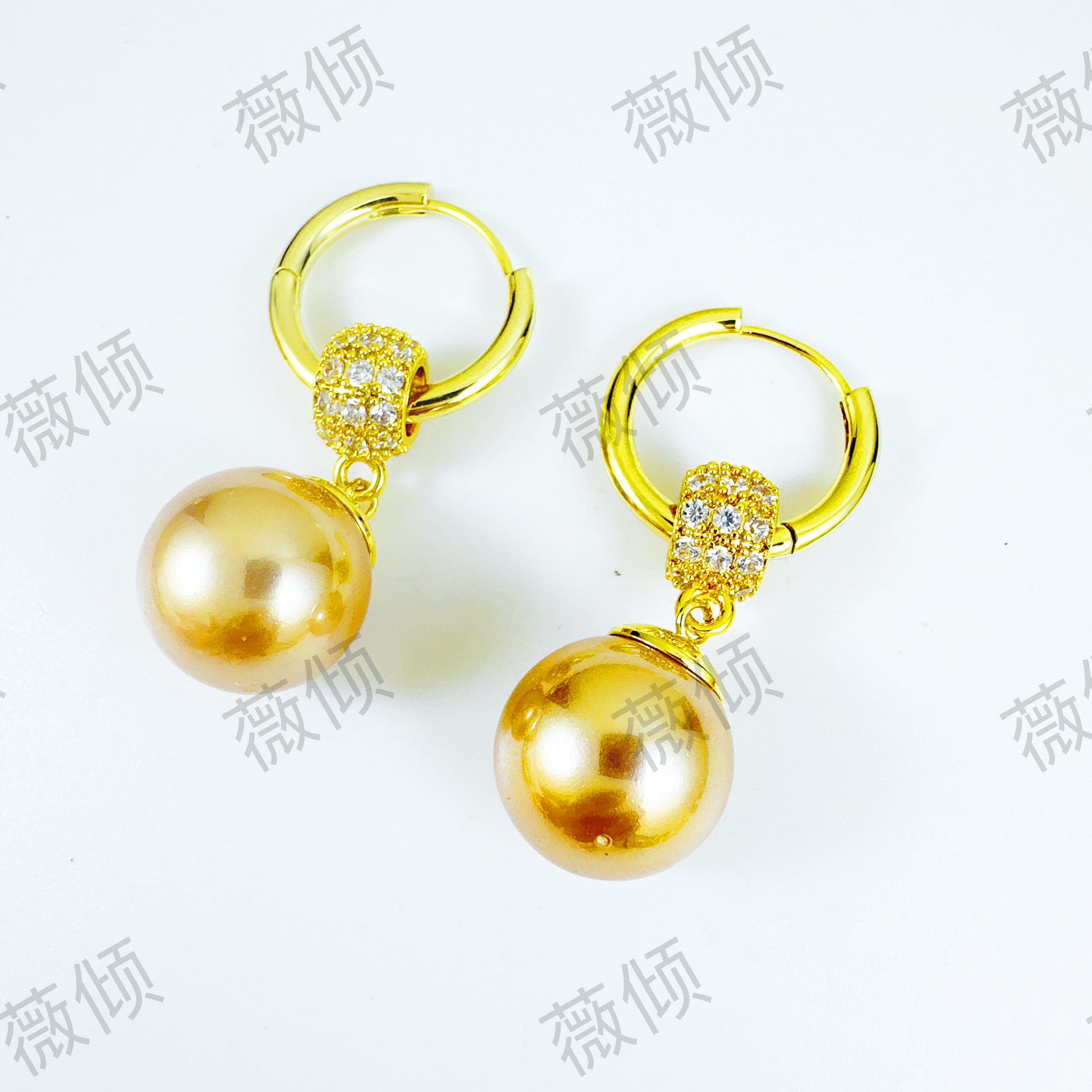 Elegant 14-karat gold-plated interlocking earrings