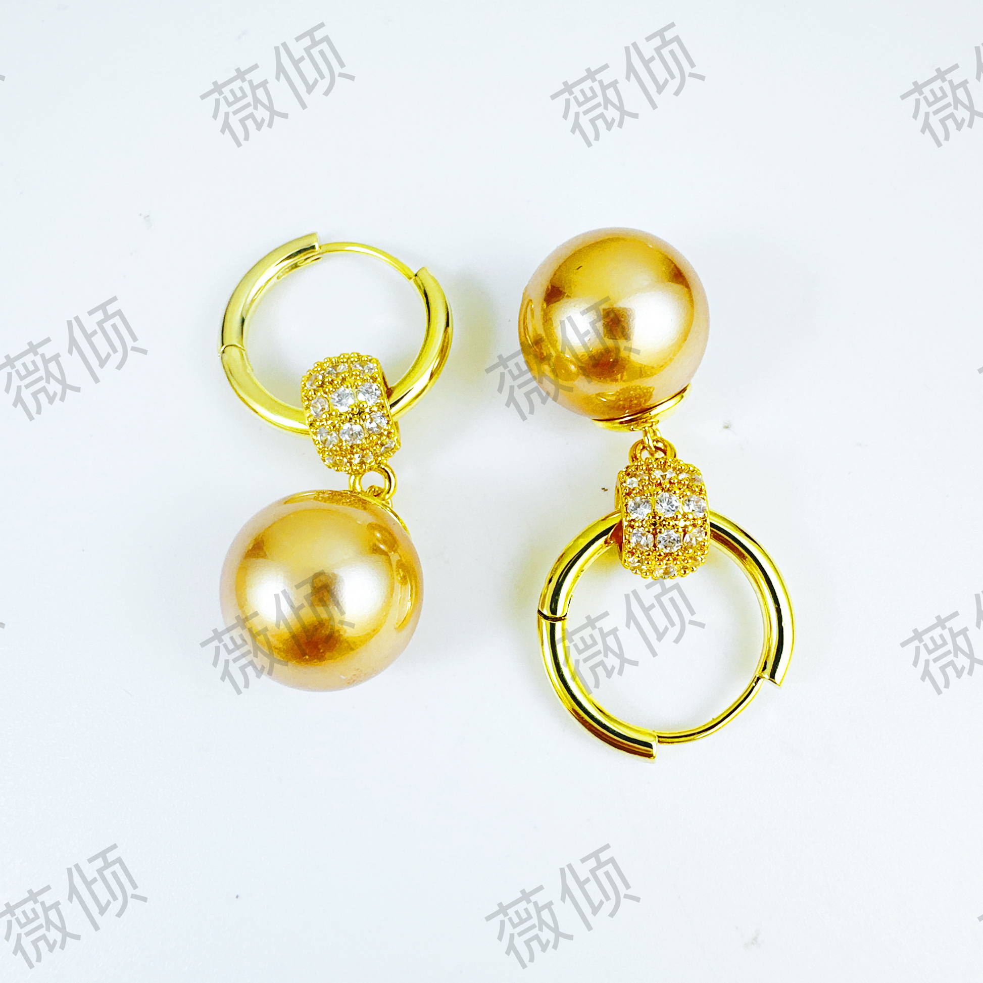 Elegant 14-karat gold-plated interlocking earrings